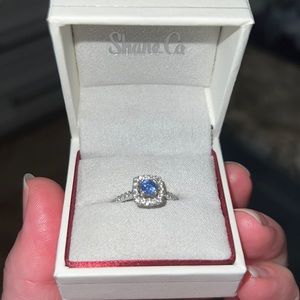 Shane Co Engagement Ring Diamond Halo Setting with Round Cut Blue Sapphire